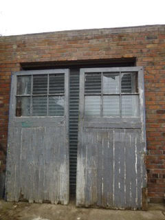 Massive pair of pine glazed doors